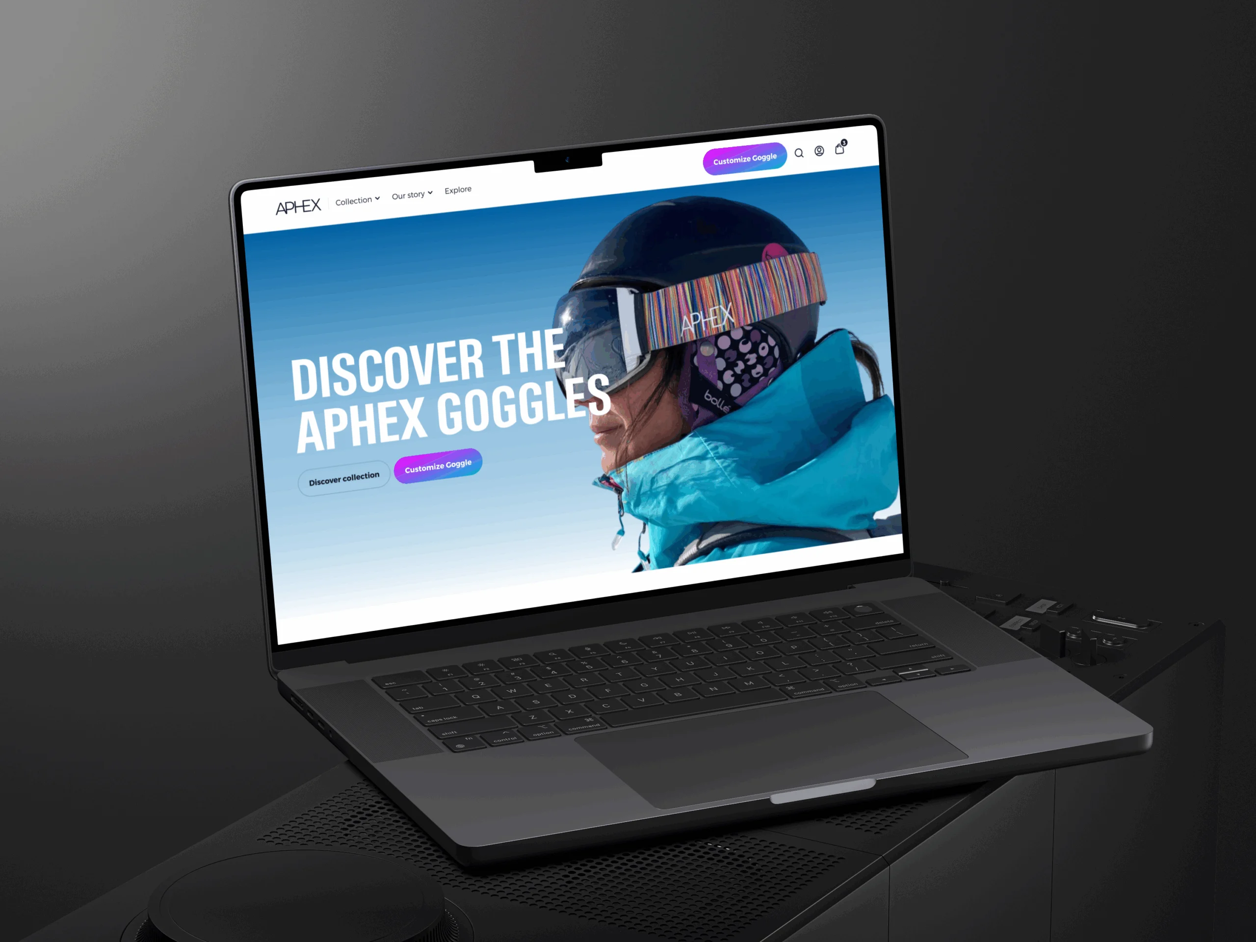 Laptop met scherm toont webpagina over APHEX Goggles met knoppen en afbeelding van persoon in ski-outfit